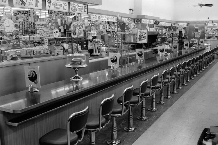 1950s-1960s Interior Of Lunch Counter With Chrome Stools by Vintage Images wall art