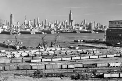 1950s-1960s Skyline Midtown Manhattan From Across The Hudson River Railroad Tracks Foreground In West New York NJ USA by Vintage Images framed wall art