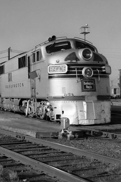 Railroads: 1950s-1960s Streamlined Burlington Route Railroad Train Diesel Locomotive Engine At Station by Vintage Images