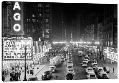 1953 Night Scene Of Chicago State Street With Traffic And Movie Marquee With Pedestrians On The Sidewalks Canvas Art Print - Automobile Art