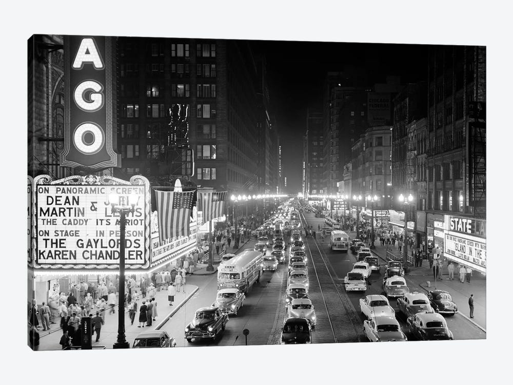 1953 Night Scene Of Chicago State Street With Traffic And Movie Marquee With Pedestrians On The Sidewalks by Vintage Images 1-piece Art Print