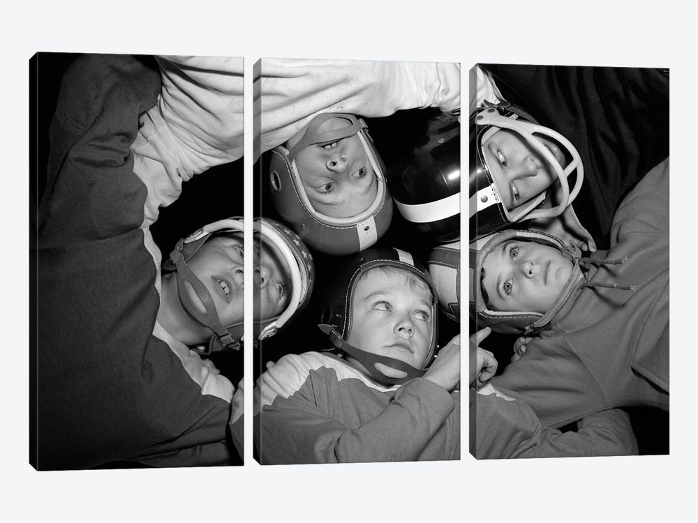 1960s Five Boys In Huddle Wearing Helmets & Football Jerseys The View Is From Inside The Huddle Looking Up by Vintage Images 3-piece Art Print