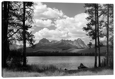 1960s Little Red Fish Lake In Idaho With Saw Tooth Mountains In Background Viewed Between Clearing In Trees Canvas Art Print - Black & White Photography