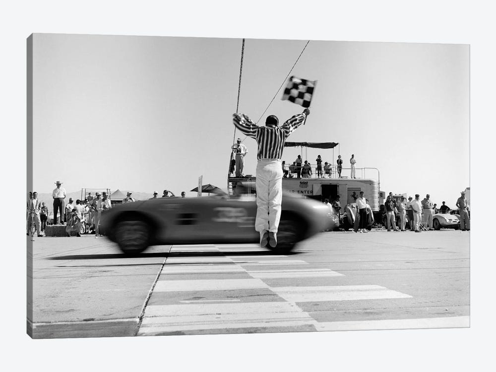 1960s Man Jumping Waving Checkered Flag For Winning Sports Car Crossing The Finish Line by Vintage Images 1-piece Canvas Wall Art