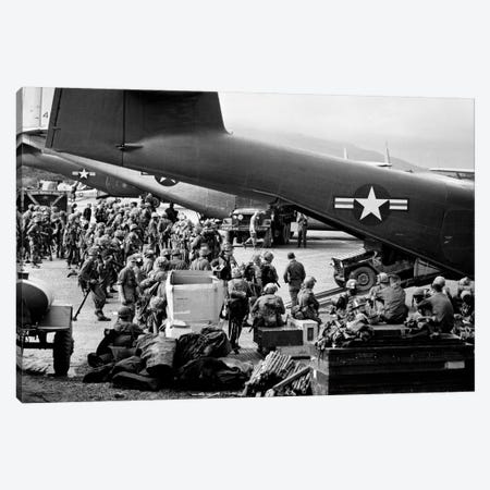 1960s Military Personnel Gathered Under Tails Of Planes In Airfield Waiting To Be Airlifted For Special Operation In Vietnam Canvas Print #VTG437} by Vintage Images Canvas Artwork
