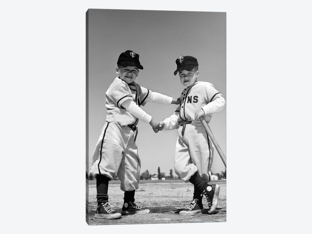 1960s Pair Of Little Leaguers In Uniform Shaking Hands One Holding Bat Looking At Camera by Vintage Images 1-piece Canvas Art Print