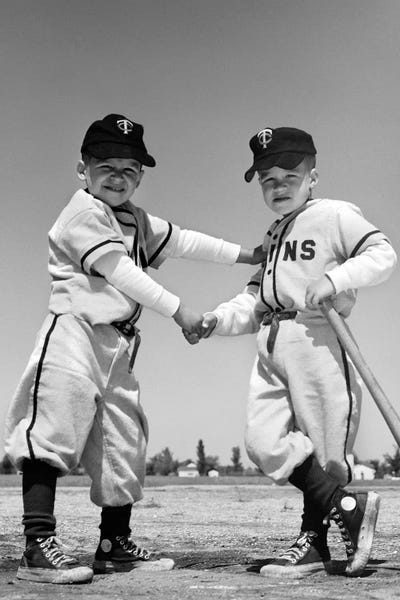 Kids Sports Art: 1960s Pair Of Little Leaguers In Uniform Shaking Hands One Holding Bat Looking At Camera by Vintage Images