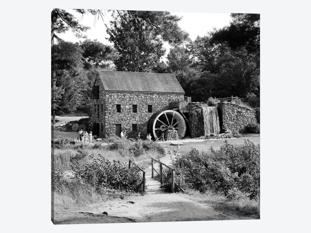 1960s People Tourists Visiting Rustic Grist Mill With Stone Structure Waterfall And Waterwheel Sudbury Massachusetts USA by Vintage Images 1-piece Canvas Art Print