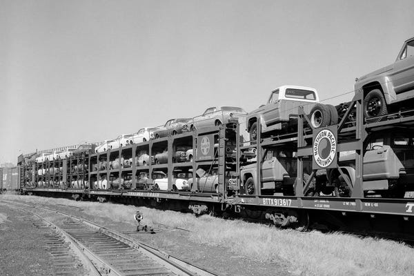 Railroads: 1960s Railroad Freight Train Carrying Automobiles And Pickup Trucks by Vintage Images