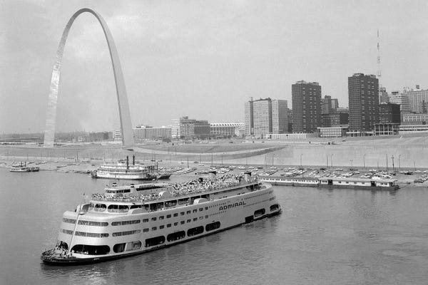 Arches: 1960s St. Louis Missouri Gateway Arch Skyline Mississippi River SS Admiral Casino And Other Riverboats by Vintage Images