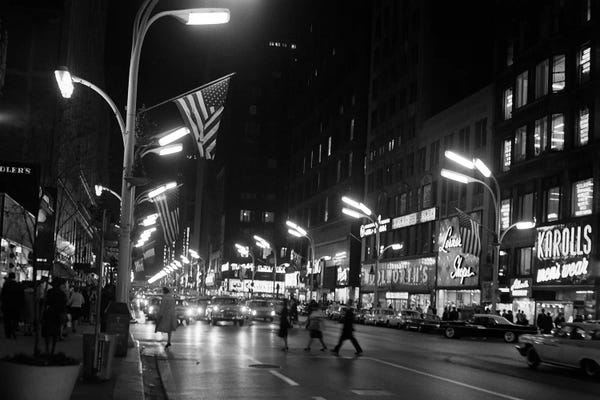 Illinois: 1963 Night Scene Of Busy Traffic On State Street Chicago Illinois USA by Vintage Images