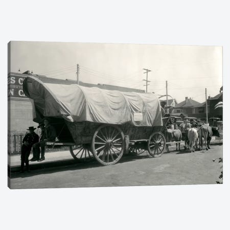 1920s Ox Drawn Conestoga Covered Wagon Parked Along Street Canvas Print #VTG47} by Vintage Images Art Print