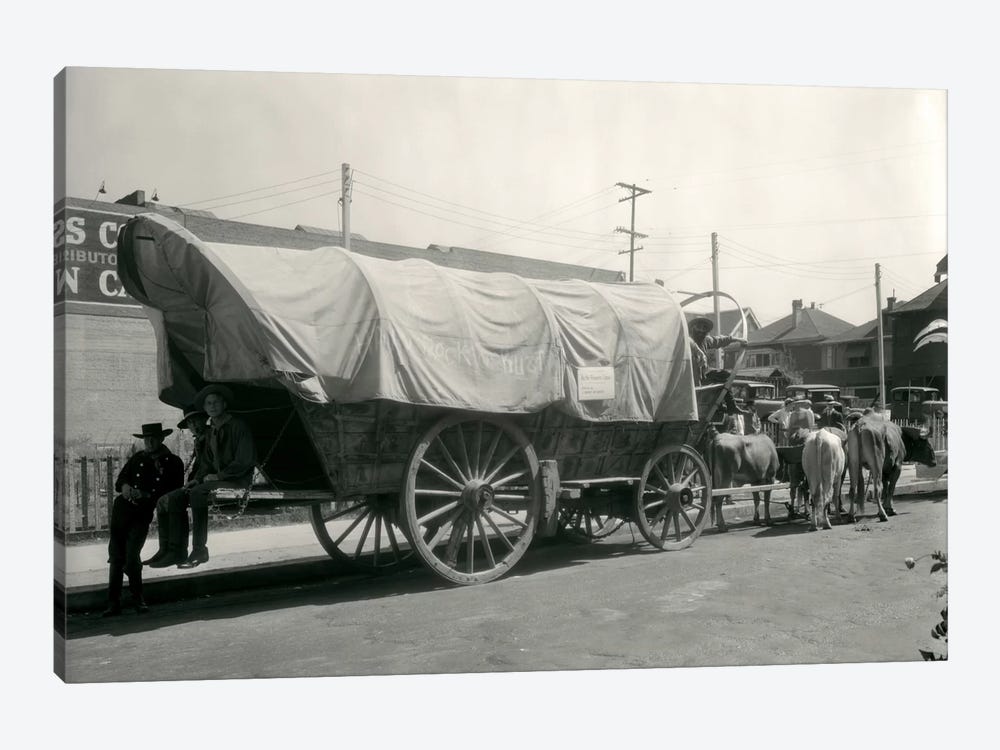 1920s Ox Drawn Conestoga Covered Wagon Parked Along Street by Vintage Images 1-piece Canvas Art Print