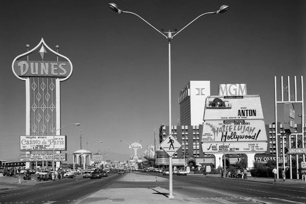 Gambling: 1980s Daytime The Strip With Signs For The Dunes MGM Flamingo Las Vegas Nevada USA by Vintage Images