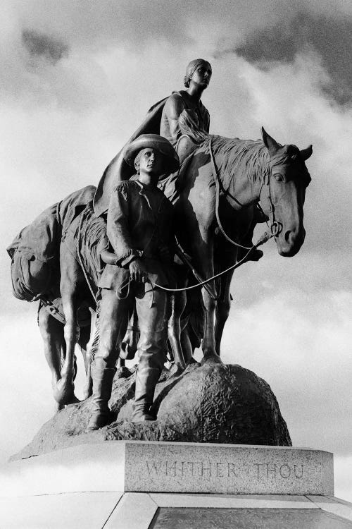 Statue Of Pioneer Woman Holding Baby On Horse Led By Husband In Penn Valley Park Kansas City Missouri USA Dedicated 1927