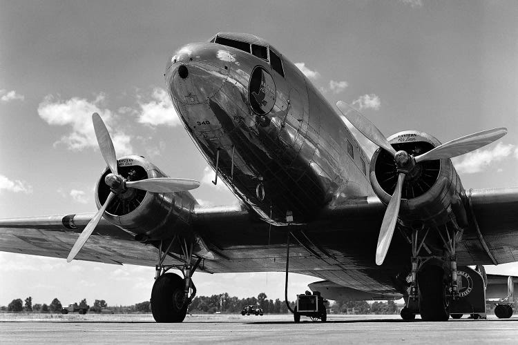 1940s Domestic Propeller Passenger Airplane Dual Engine Landing Gear Nose And Partial Wings Visible