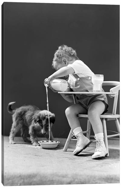 1940s Toddler Sitting In Chair Pouring Milk From Bottle Into Bowl For Puppy Dog Canvas Art Print