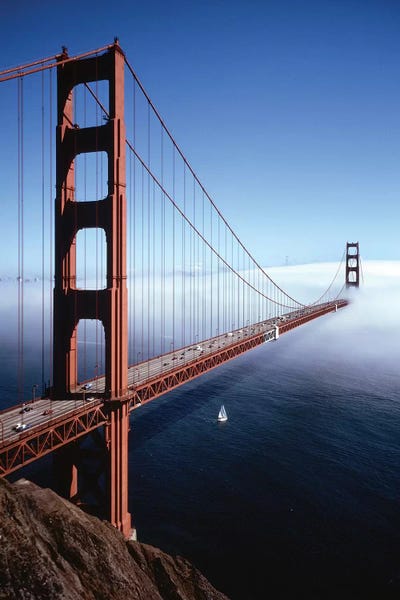 Golden Gate Bridge: 1980s Golden Gate Bridge With Fog Over City Of San Francisco CA, USA by Vintage Images