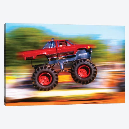 Big Wheeled Red Truck Jumping Blurred Background Canvas Print #VTG614} by Vintage Images Canvas Artwork