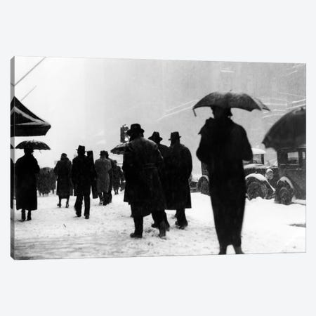 1920s-1930s Crowd Of Anonymous Pedestrians Silhouetted By Snow Storm Walking On City Street Sidewalk Canvas Print #VTG62} by Vintage Images Canvas Wall Art