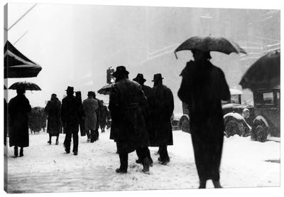 1920s-1930s Crowd Of Anonymous Pedestrians Silhouetted By Snow Storm Walking On City Street Sidewalk Canvas Art Print