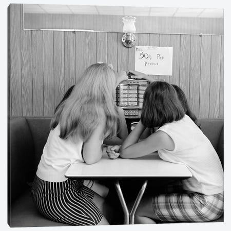 1960s Four Teenage Girls Putting Coins In Slot Of Small Individual Juke Box Of Diner Soda Shop Canvas Print #VTG657} by Vintage Images Canvas Wall Art