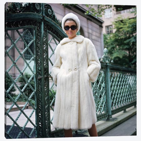 1960s Woman Wearing White Fur Coat Hat Sunglasses By Wrought Iron Gate Clothes Canvas Print #VTG661} by Vintage Images Canvas Art