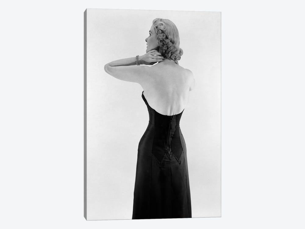 1950S Blonde Woman Wearing Black Strapless Gown Hands And Arms Reaching To Her Neck by Vintage Images 1-piece Canvas Artwork