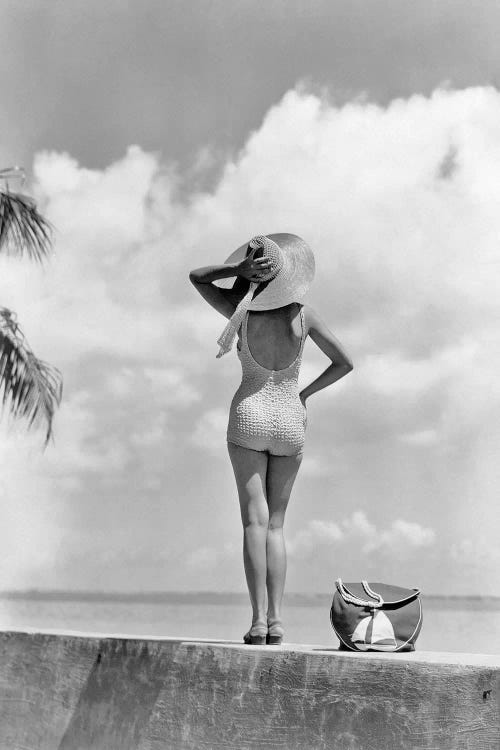 1930S 1940S Anonymous Womanstanding On Tropical Beach Wall