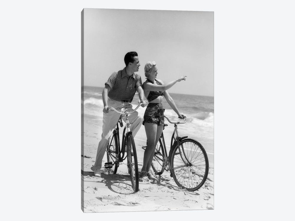 1930s Couple Man Woman Biking On Beach Woman Pointing To Horizon by Vintage Images 1-piece Canvas Print