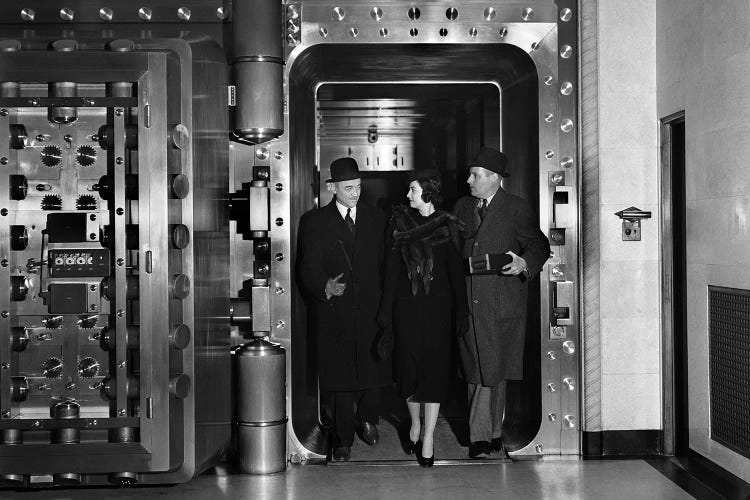 1930s Men And Woman Walking Out Of Bank Vault Wearing Hats And Coats