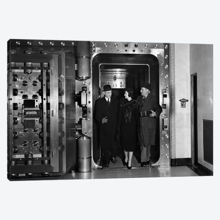 1930s Men And Woman Walking Out Of Bank Vault Wearing Hats And Coats Canvas Print #VTG684} by Vintage Images Art Print