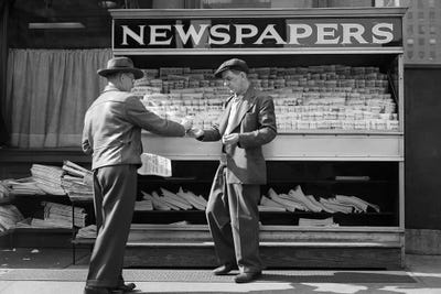 1940s Man Buying Newspaper From Vendor On Sidewalk New York City by Vintage Images canvas print