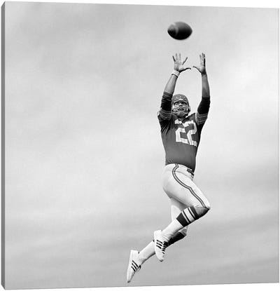 1970s Player Jumping To Catch Football Pass Canvas Art Print - Action Shot Photography