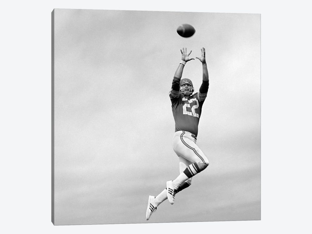1970s Player Jumping To Catch Football Pass by Vintage Images 1-piece Canvas Print