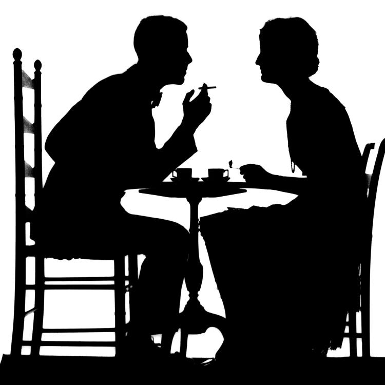 1920s-1930s Silhouette Of Anonymous Couple Sitting At Tea Table With Teacups Man Smoking Cigarette