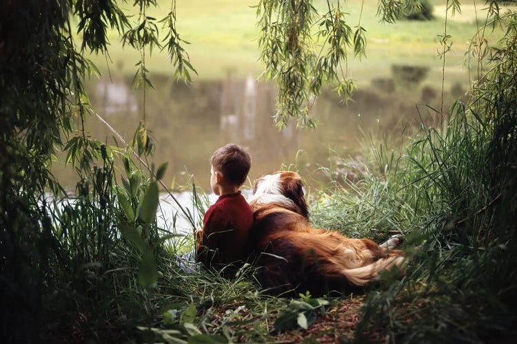 1960s-1970s Boy Fishing With His Dog By His Side