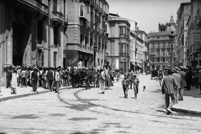 1920s-1930s Street Scene With Crowd In Front Of Hotel Regina Malaga Spain by Vintage Images canvas print