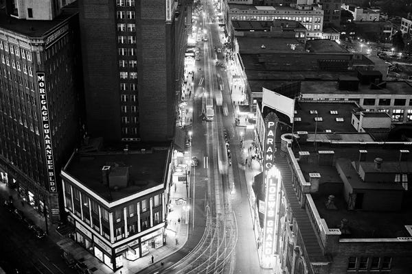 Georgia: 1930s 1940s Looking Down City Street Pedestrians Trolley Cars Neon Signs At Night From The Candler Building Atlanta Georgia USA by Vintage Images