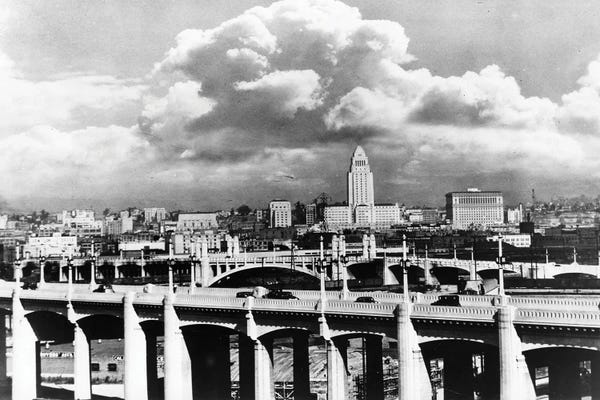 Los Angeles Skylines: 1930s Skyline With Los Angeles Bridge In Foreground Los Angeles California USA by Vintage Images