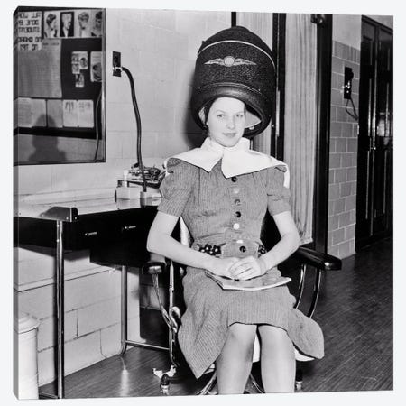 1930s Smiling Woman Looking At Camera Sitting Under Electric Hair Dryer In Professional Beautician Training School Canvas Print #VTG764} by Vintage Images Canvas Wall Art