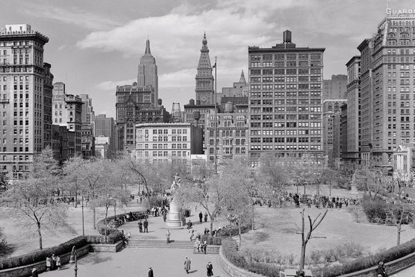 City Parks: 1940s 1950s Spring Day Union Square Looking North To Empire State And Met Life Buildings Manhattan New York City New York USA by Vintage Images