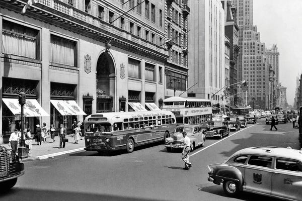 Manhattan: 1940s Pedestrians Buses Cars Cabs 5Th Avenue Traffic Looking North Lord & Taylor Department Store Manhattan New York City Ny USA by Vintage Images