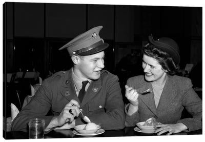 1940s Smiling Couple Man Soldier In Army Uniform And Woman Girlfriend Sitting At Soda Fountain Counter Eating Dish Of Ice Cream Canvas Art Print - Vintage Images