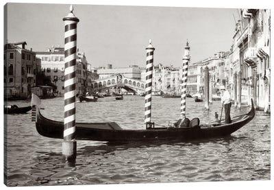 1950s Anonymous Businessman Riding In Gondola Rowing Boat On The Grand Canal The Rialto Bridge In Background Venice Italy Canvas Art Print - Vintage Images