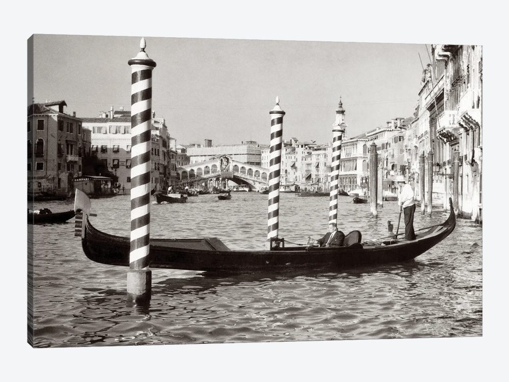 1950s Anonymous Businessman Riding In Gondola Rowing Boat On The Grand Canal The Rialto Bridge In Background Venice Italy by Vintage Images 1-piece Canvas Art