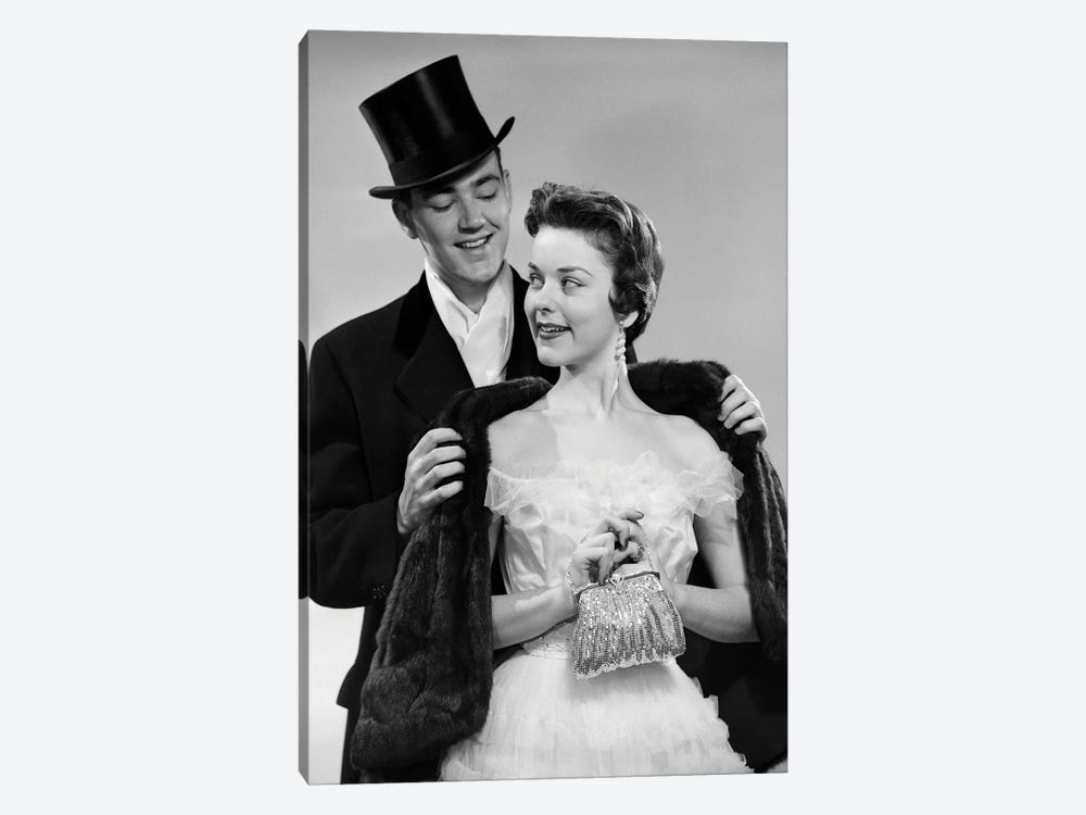 1950s Couple Formal Attire Man Wearing Top Hat Helping Woman In Evening Clothes With Fur Stole by Vintage Images 1-piece Canvas Artwork