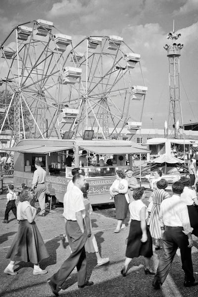Ferris Wheels: 1950s Crowd Men Women Teenagers Attending Walking On The Midway Of The York County Fair Pennsylvania USA by Vintage Images