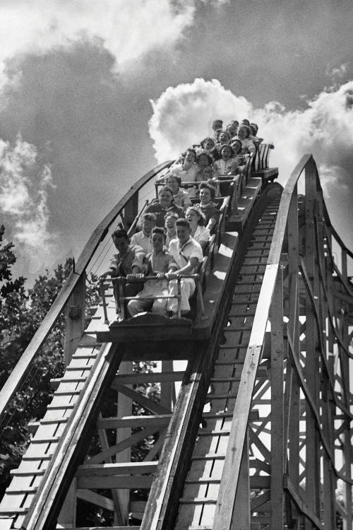 1950s Group Of Teens On Roller Coaster Coming Over And Down The Top Of Crest Outdoor