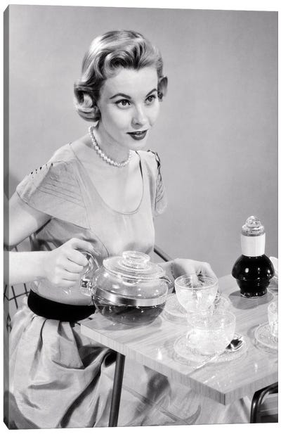 1950s Hostess Woman Housewife Serving Pouring Tea Coffee Seated At Table Canvas Art Print - Vintage Images